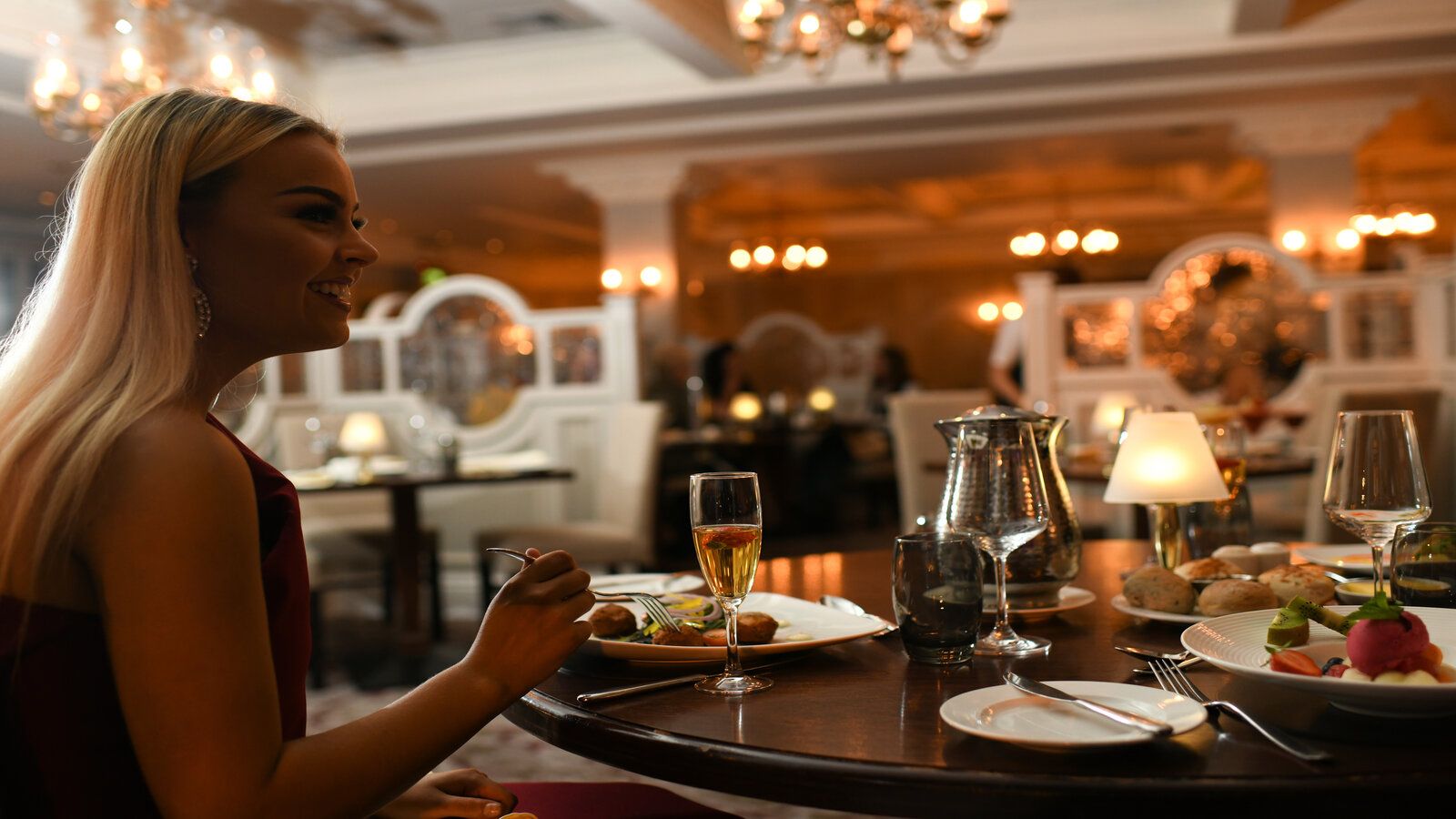 Enjoying Meal in Old Mill Restaurant with warm lighting